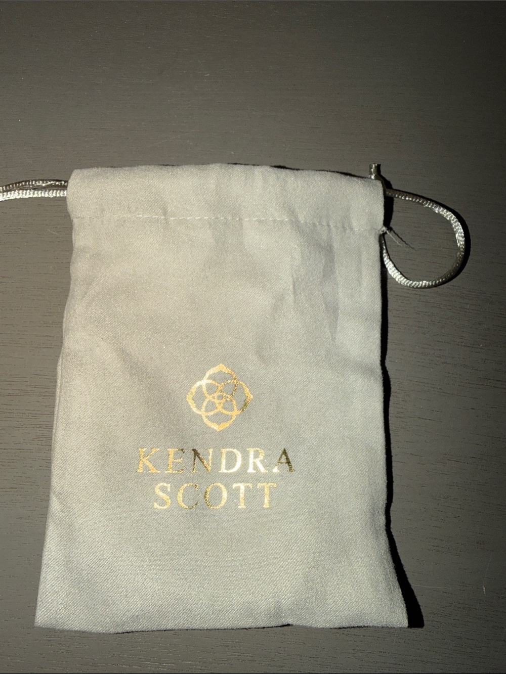 Kendra Scott Gray Drawstring Jewelry Pouch with Gold Logo